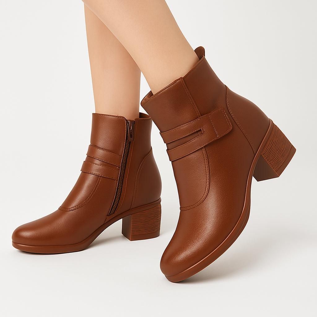 Mulher usando a Bota Ortopédica Feminina Susana da Mazarato em couro marrom, com zíper lateral e salto médio bloco, destacando conforto e estilo.